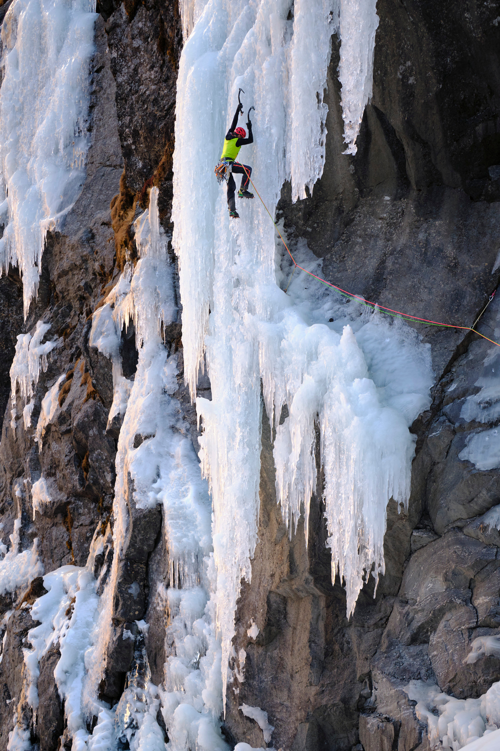 A man ice climbing.